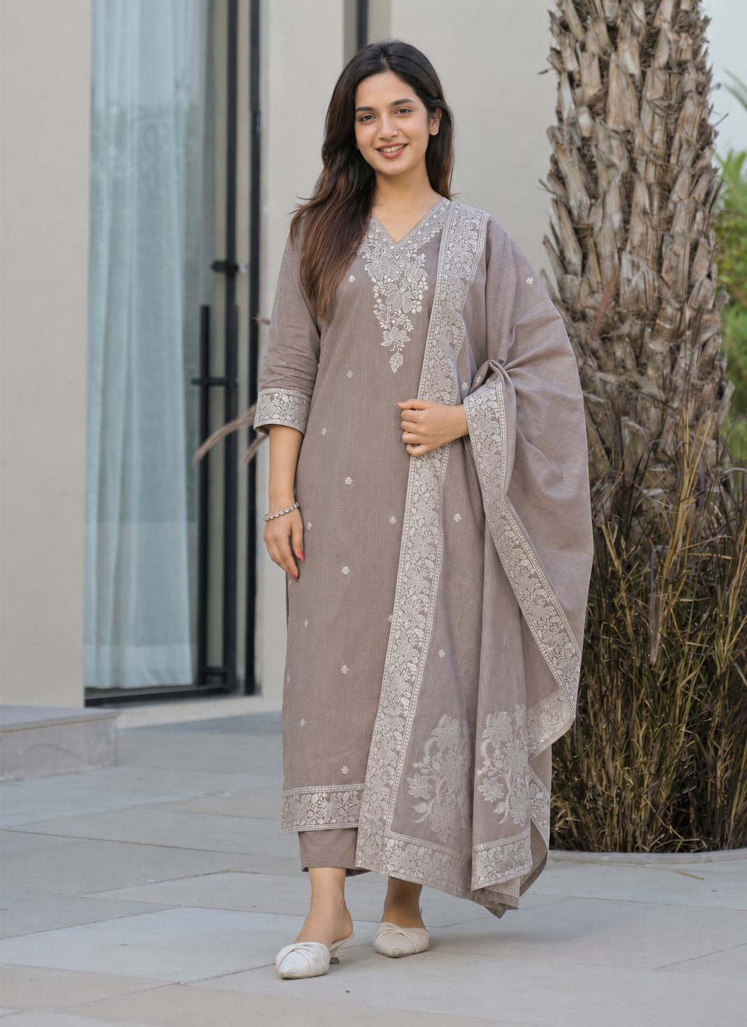 Chhaya grey cotton kurta with white butis scattered down the length and a V neck
