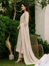 Side view of the Mogra beige cotton kurta set showing its straight fall and embroidered dupatta border