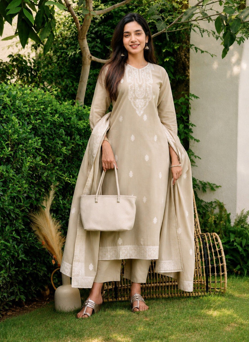 Mogra beige cotton kurta set with white thread embroidered yoke, matching pants and dupatta, front view