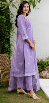 Side view of the Kachnar lavender cotton kurta set with embroidered hem and sheer dupatta